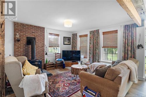 82 Macdonalds Point Wharf Road, Wickham, NB - Indoor Photo Showing Living Room With Fireplace