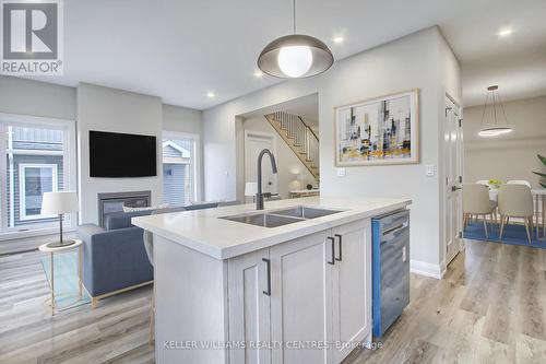 16 John Harvey Street, Uxbridge, ON - Indoor Photo Showing Kitchen With Fireplace With Double Sink