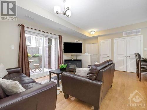 301 Big Sky Private Unit#5, Ottawa, ON - Indoor Photo Showing Living Room With Fireplace