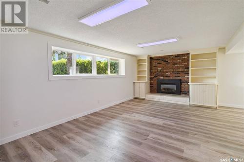 70 Duncan Crescent, Saskatoon, SK - Indoor Photo Showing Other Room With Fireplace