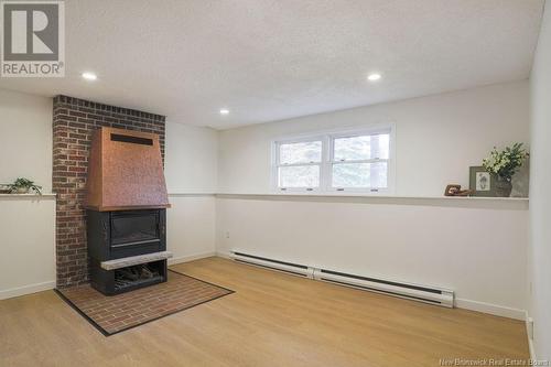 6 Minstrel Drive, Quispamsis, NB - Indoor With Fireplace