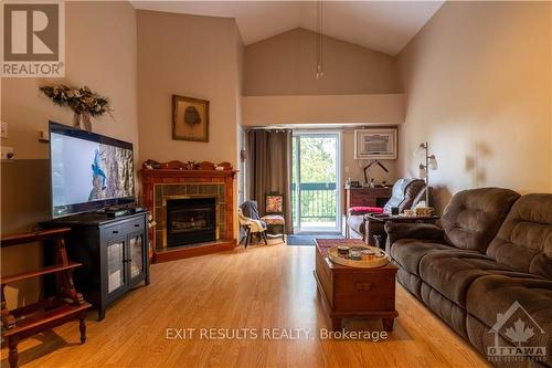 1202 Clement Street, Prescott And Russell, ON - Indoor Photo Showing Living Room With Fireplace