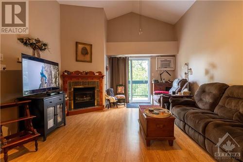 1202 Clement Street, Hawkesbury, ON - Indoor Photo Showing Living Room With Fireplace