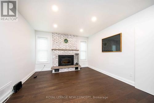 323 Cumberland Court E, Oshawa, ON - Indoor Photo Showing Living Room With Fireplace