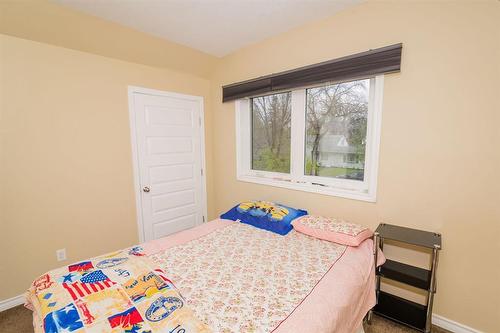 122 1St Street Se, Carman, MB - Indoor Photo Showing Bedroom