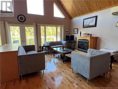 12 Sunset Lane, Currie, NB - Indoor Photo Showing Living Room With Fireplace