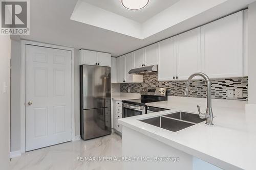 1 - 45 Cedarcroft Boulevard, Toronto, ON - Indoor Photo Showing Kitchen With Double Sink With Upgraded Kitchen