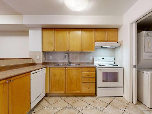 2001-3880 Duke Of York Blvd W, Mississauga, ON - Indoor Photo Showing Kitchen With Double Sink