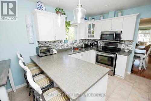 128 Smallman Drive, Wasaga Beach, ON - Indoor Photo Showing Kitchen With Double Sink