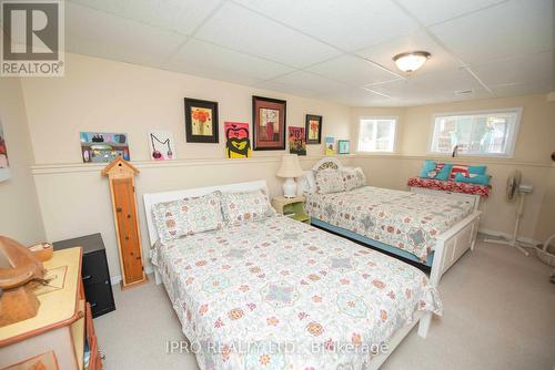 128 Smallman Drive, Wasaga Beach, ON - Indoor Photo Showing Bedroom