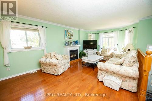 128 Smallman Drive, Wasaga Beach, ON - Indoor Photo Showing Living Room With Fireplace