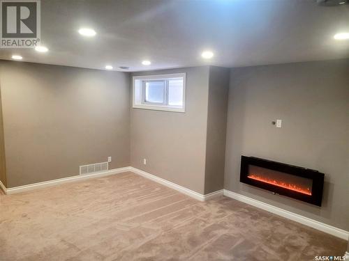 8718 Hincks Lane, Regina, SK - Indoor With Fireplace