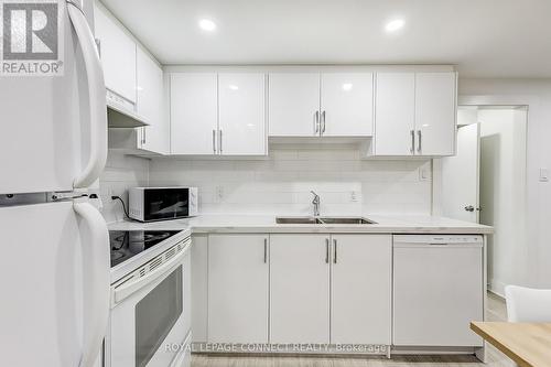 103 Lexington Avenue, Toronto, ON - Indoor Photo Showing Kitchen With Double Sink