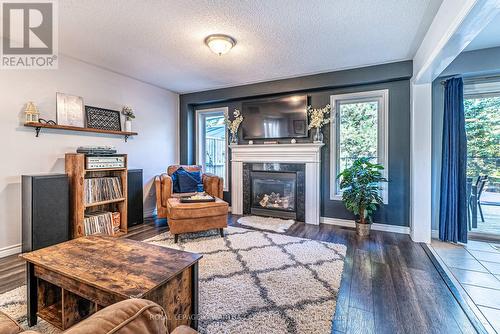 8 Fallingbrook Crescent, Kawartha Lakes (Lindsay), ON - Indoor Photo Showing Living Room With Fireplace