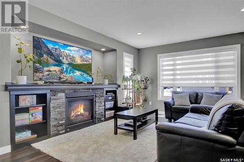 4338 Albulet Drive, Regina, SK - Indoor Photo Showing Living Room With Fireplace