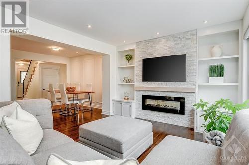 440 White Arctic Avenue, Ottawa, ON - Indoor Photo Showing Living Room With Fireplace