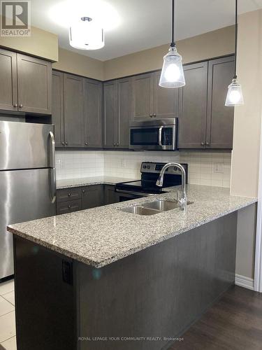 201 - 9255 Jane Street, Vaughan, ON - Indoor Photo Showing Kitchen With Double Sink With Upgraded Kitchen