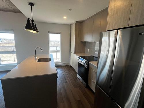 Kitchen - 1601-3980 Boul. St-Elzear O., Laval (Chomedey), QC - Indoor Photo Showing Kitchen With Upgraded Kitchen