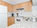 221-230 Queens Quay W, Toronto, ON  - Indoor Photo Showing Kitchen With Double Sink 