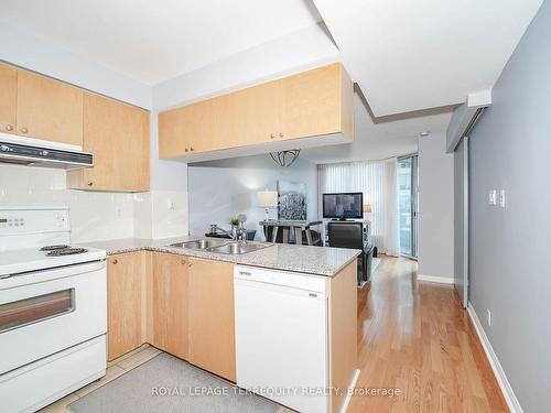 221-230 Queens Quay W, Toronto, ON - Indoor Photo Showing Kitchen With Double Sink