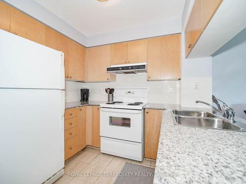 221-230 Queens Quay W, Toronto, ON - Indoor Photo Showing Kitchen With Double Sink