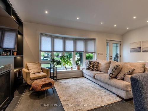 26 Vanderbrent Cres, Toronto, ON - Indoor Photo Showing Living Room With Fireplace