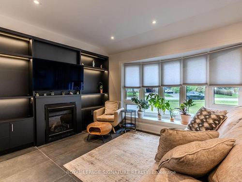 26 Vanderbrent Cres, Toronto, ON - Indoor Photo Showing Living Room With Fireplace