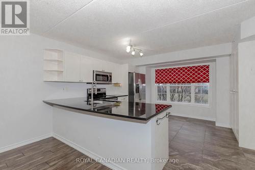 211 - 2055 Appleby Line, Burlington, ON - Indoor Photo Showing Kitchen