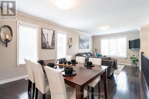 27 Marilyn Avenue S, Wasaga Beach, ON - Indoor Photo Showing Dining Room With Fireplace