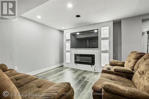 2 - 59 Kenninghall Boulevard, Mississauga, ON - Indoor Photo Showing Living Room With Fireplace