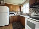 53 Mcgee Crescent, Saskatoon, SK  - Indoor Photo Showing Kitchen With Double Sink 