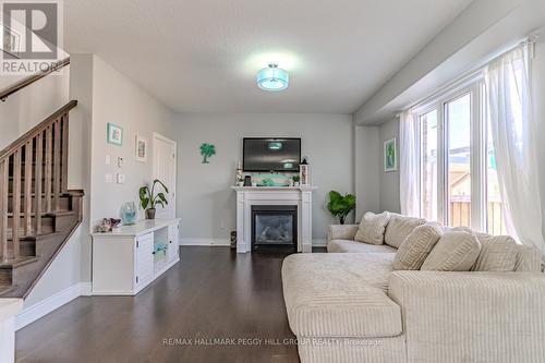 82 Nathan Crescent, Barrie, ON - Indoor Photo Showing Living Room With Fireplace