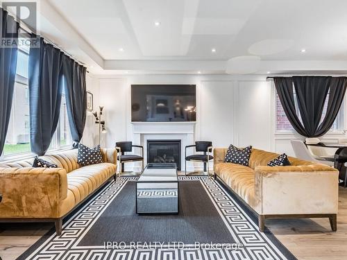 1406 Lobelia Crescent, Milton, ON - Indoor Photo Showing Living Room With Fireplace