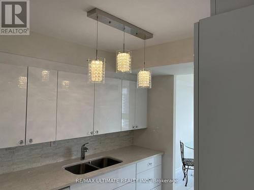 1410 - 3233 Eglinton Avenue E, Toronto, ON - Indoor Photo Showing Kitchen With Double Sink