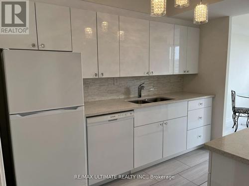 1410 - 3233 Eglinton Avenue E, Toronto, ON - Indoor Photo Showing Kitchen With Double Sink