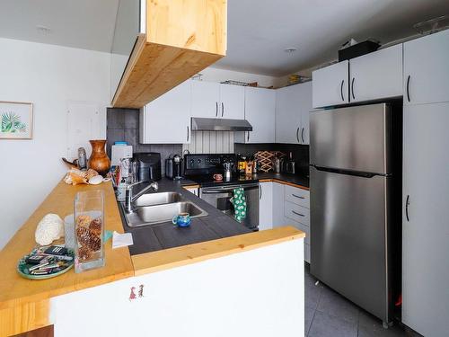 Cuisine - 3 Rue Berlioz, Montréal (Verdun/Île-Des-Soeurs), QC - Indoor Photo Showing Kitchen With Double Sink