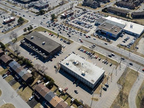 Aerial photo - 210-3633 Boul. Des Sources, Dollard-Des-Ormeaux, QC -  With View