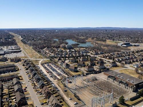 Aerial photo - 210-3633 Boul. Des Sources, Dollard-Des-Ormeaux, QC - Outdoor With View