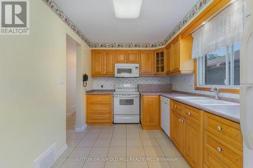 18 Bankfield Drive, Toronto, ON - Indoor Photo Showing Kitchen With Double Sink