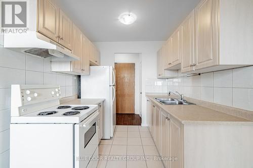 606 - 50 Gulliver Road, Toronto, ON - Indoor Photo Showing Kitchen With Double Sink