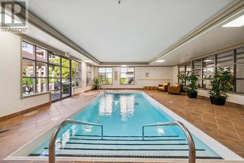 2115 - 100 Burloak Drive, Burlington, ON - Indoor Photo Showing Other Room With In Ground Pool