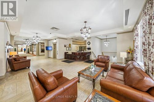 2115 - 100 Burloak Drive, Burlington, ON - Indoor Photo Showing Living Room