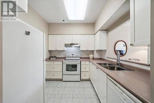 2115 - 100 Burloak Drive, Burlington, ON - Indoor Photo Showing Kitchen With Double Sink