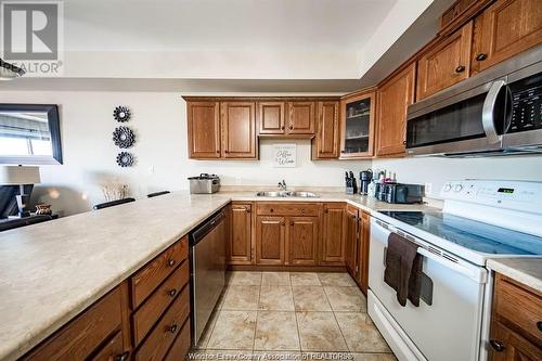 1855 Normandy Unit# 604, Lasalle, ON - Indoor Photo Showing Kitchen With Double Sink