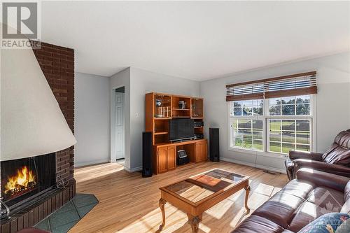 1447 Cedar Lane, Ottawa, ON - Indoor Photo Showing Living Room With Fireplace