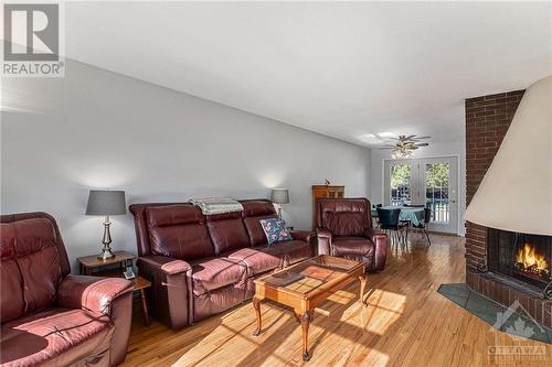 1447 Cedar Lane, Ottawa, ON - Indoor Photo Showing Living Room With Fireplace