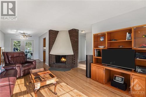 1447 Cedar Lane, Ottawa, ON - Indoor Photo Showing Living Room With Fireplace