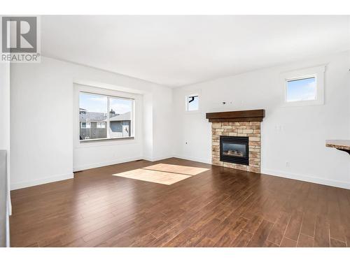 4406B 25Th Street, Vernon, BC - Indoor Photo Showing Living Room With Fireplace