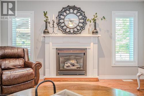 Cozy Gas Fireplace in the living room - 310 Lanark Street, Caledonia, ON - Indoor Photo Showing Living Room With Fireplace