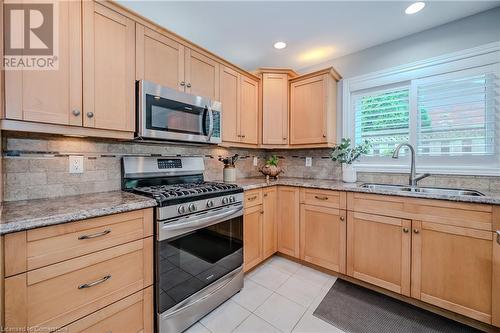 Kitchen appliances are 1year new - 310 Lanark Street, Caledonia, ON - Indoor Photo Showing Kitchen With Double Sink